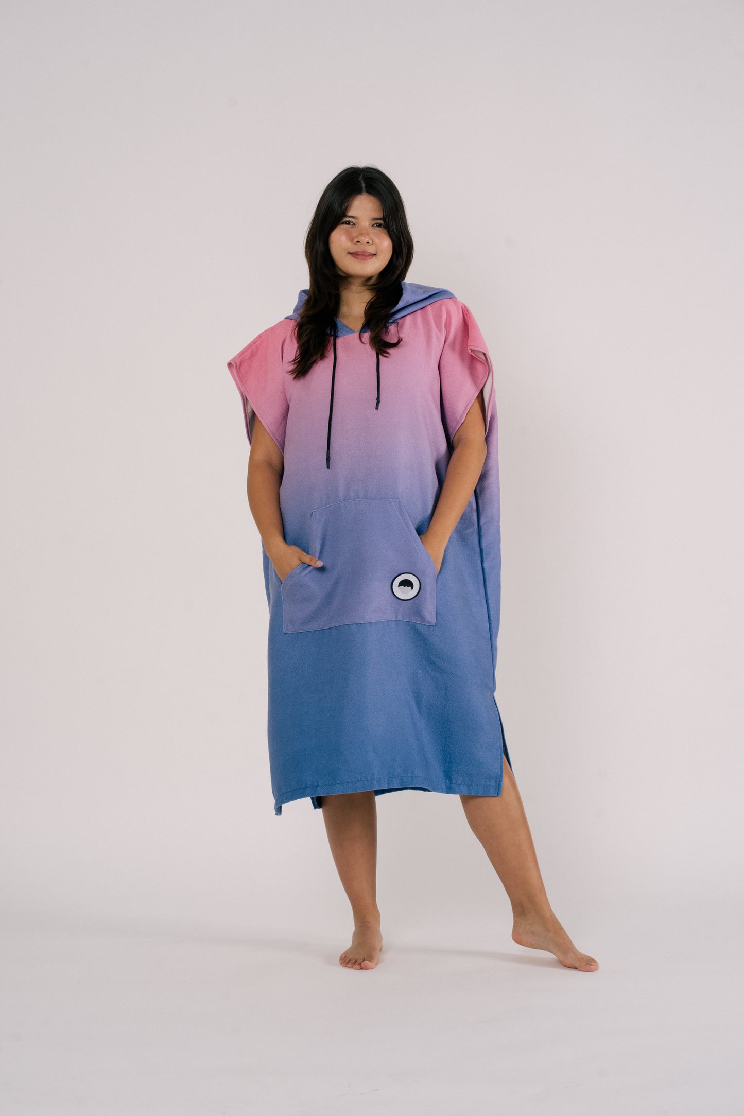 Female model wearing Changing Poncho Towel in Aurora color | Outwhere Philippines