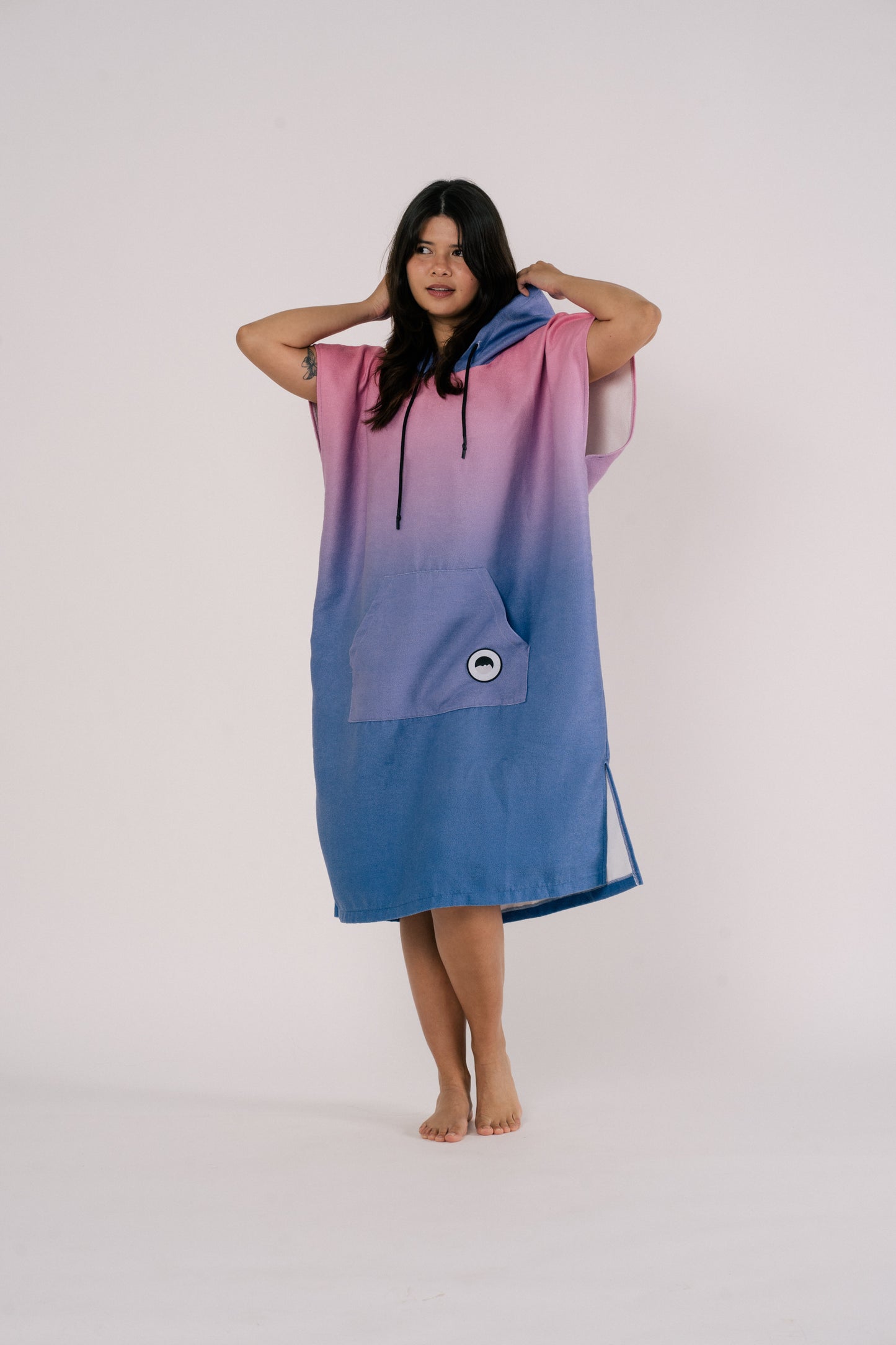 Female model wearing Changing Poncho Towel in Aurora color | Outwhere Philippines