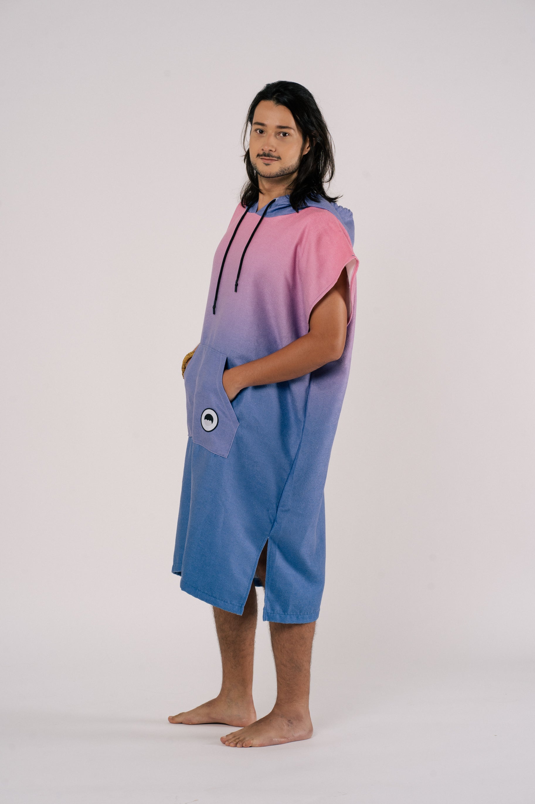Male model wearing Changing Poncho Towel in Aurora color | Outwhere Philippines